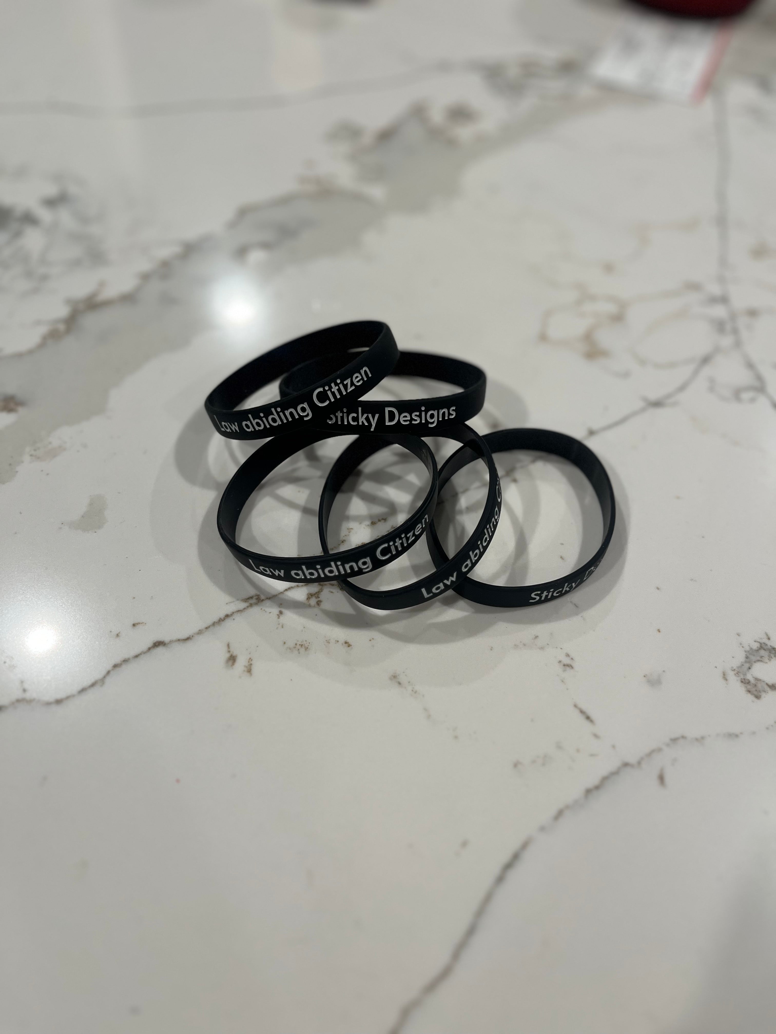 "LAW ABIDING CITIZEN" Bracelet/ Phone holderr